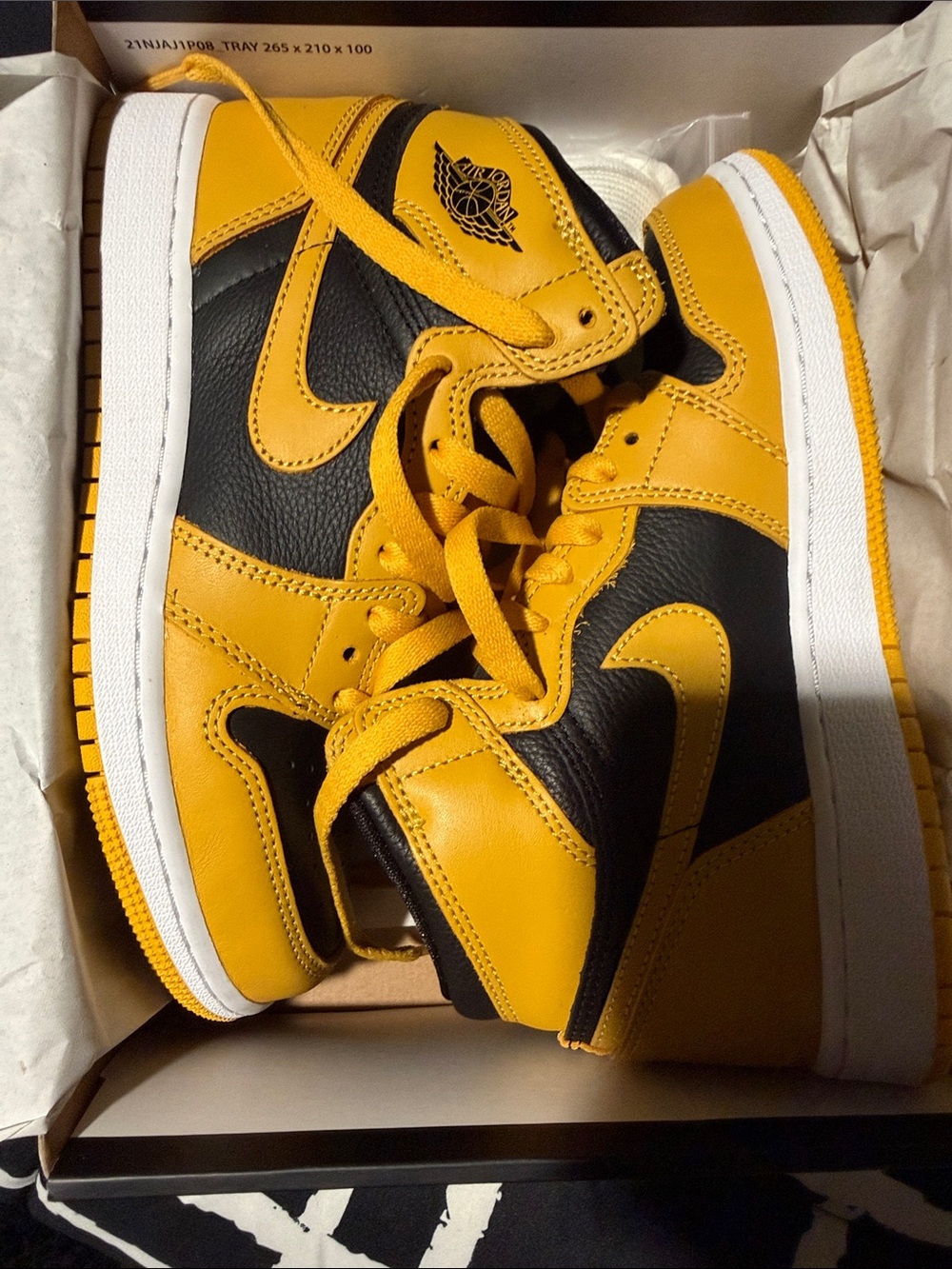 Jordan 1 Mid Sneakers in Yellow and Black